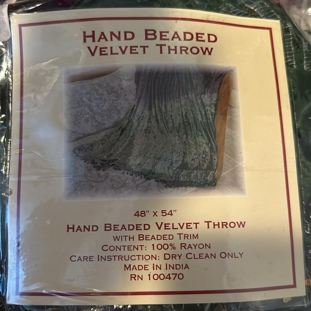 NWOT. HAND BEADED VELVET THROW